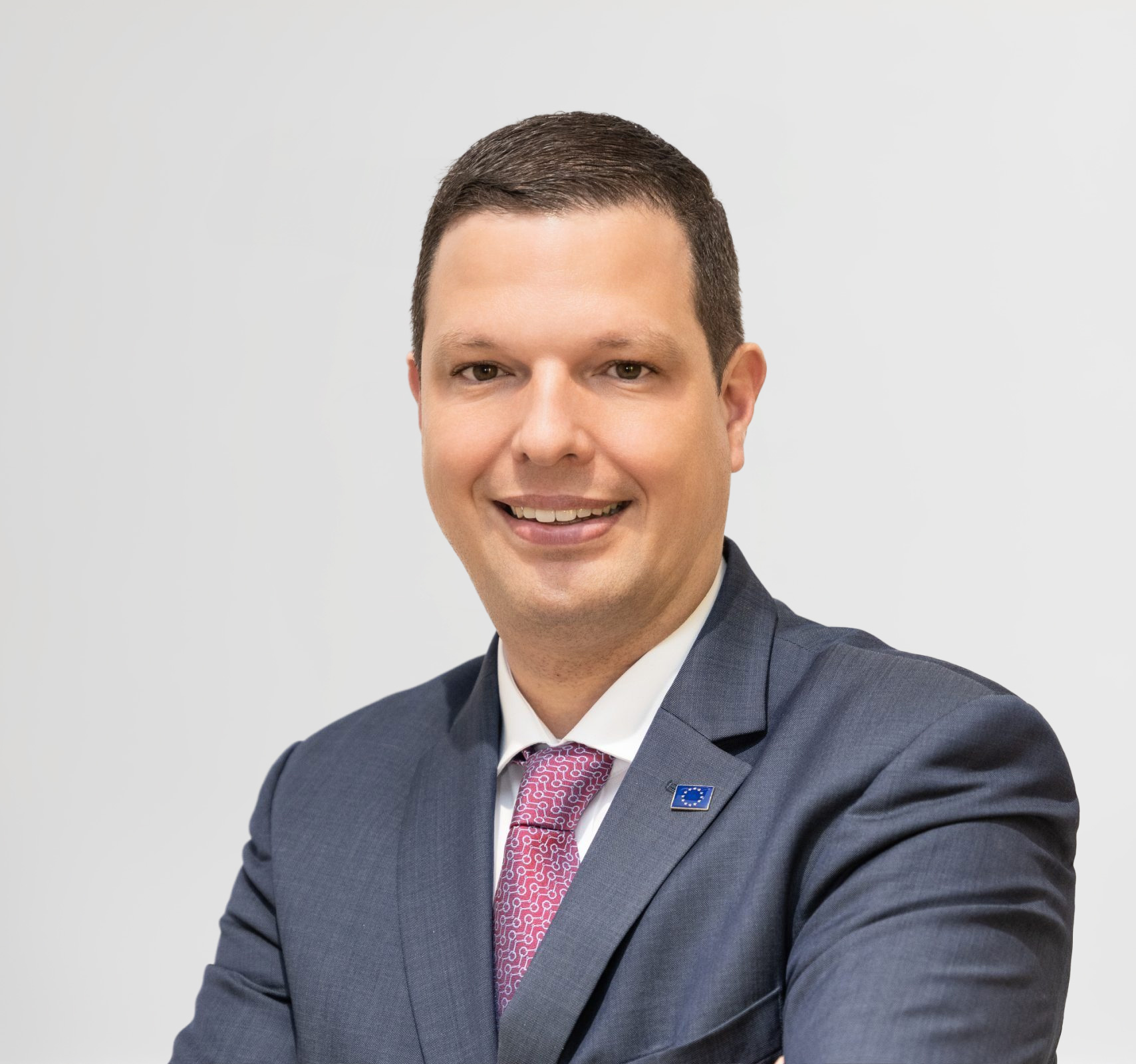 H.E. Dr. Conrad Rein